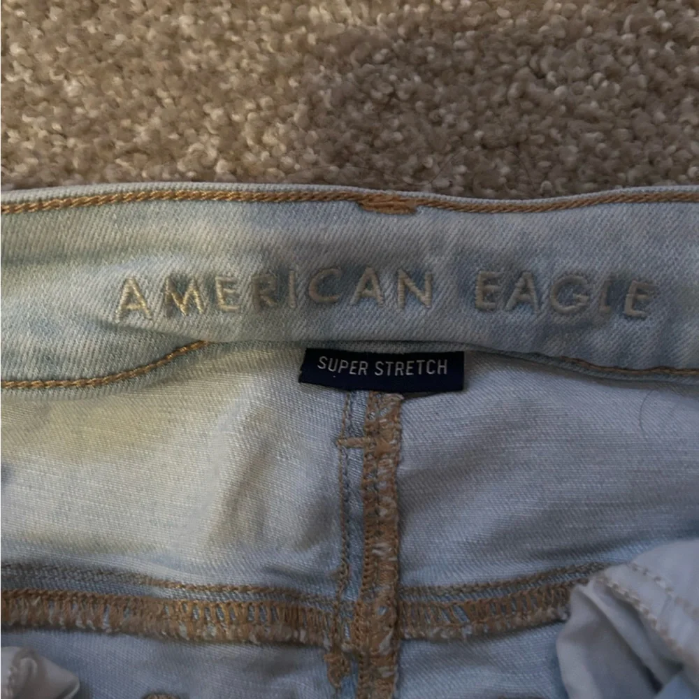 Light Blue Distressed Women's Jeans - Picture 3 of 5